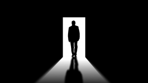 silhouette of a man by the doorway